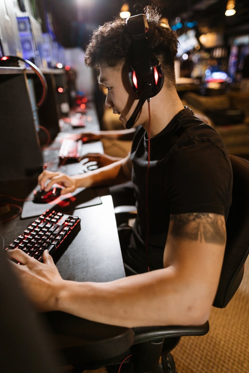 Gaming setup with multiple monitors and headset